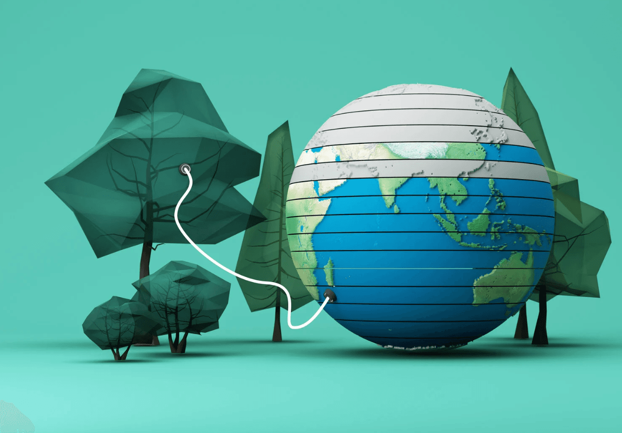 Paper figures of trees and a globe.