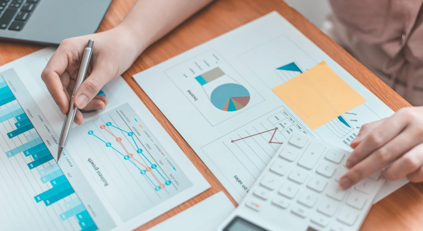 Stack of paper with graphs.
