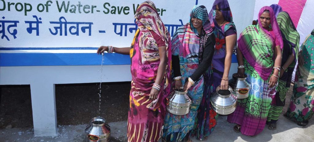 Villagers_of_Kapeli_using_the_newly_inaugurated_drinking_water_facilities.-1024x465.jpg
